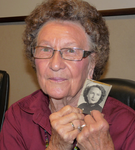 nancy with photo of younger self